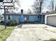 Side view of a ranch home with attached garage at 8457 W 1700 N, Elwood, IN 46036