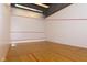 Inviting squash court with hardwood floors and crisp white walls at 350 N Meridian St # A301, Indianapolis, IN 46204