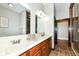 Double vanity bathroom with a large shower at 350 N Meridian St # A301, Indianapolis, IN 46204