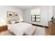 Bright bedroom with hardwood floors and large windows at 350 N Meridian St # A301, Indianapolis, IN 46204