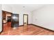 Hardwood floor bedroom with access to the kitchen and bathroom at 350 N Meridian St # A301, Indianapolis, IN 46204