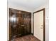 Entryway with dark wood double doors and light door at 350 N Meridian St # A301, Indianapolis, IN 46204
