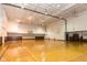 Full-sized basketball court with yellow lines and hoops at 350 N Meridian St # A301, Indianapolis, IN 46204