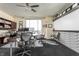 Spacious home office with large windows, two desks, and ample storage at 1 N Illinois St # 2101, Indianapolis, IN 46204