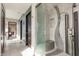 Bathroom with a walk-in shower and multiple shower heads at 1 N Illinois St # 2101, Indianapolis, IN 46204