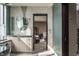 Elegant bathroom with a large vanity, soaking tub, and walk-in shower at 1 N Illinois St # 2101, Indianapolis, IN 46204