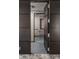 Accessible bathroom with a walk-in shower and grab bars at 1 N Illinois St # 2101, Indianapolis, IN 46204