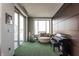 Music room with a piano and city views at 1 N Illinois St # 2101, Indianapolis, IN 46204