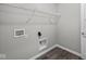 Laundry room with wire shelving and vinyl flooring at 16848 Cattle Hollow Ln, Noblesville, IN 46060