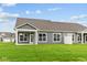 Gray house exterior with a covered patio and green lawn at 16848 Cattle Hollow Ln, Noblesville, IN 46060