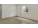 Unfinished basement with window and neutral walls at 220 Sanders St, Indianapolis, IN 46225