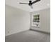 Well-lit bedroom with window and ceiling fan at 220 Sanders St, Indianapolis, IN 46225