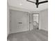 Spacious bedroom with ceiling fan and large closet at 220 Sanders St, Indianapolis, IN 46225
