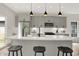 Modern kitchen with gray cabinets, white quartz countertops, and stainless steel appliances at 220 Sanders St, Indianapolis, IN 46225