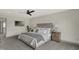 Spacious bedroom with plush carpet and large window at 220 Sanders St, Indianapolis, IN 46225