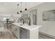 Modern kitchen island with white countertop and stainless steel appliances at 220 Sanders St, Indianapolis, IN 46225