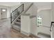 Modern staircase with gray carpet and metal railing at 220 Sanders St, Indianapolis, IN 46225