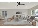 Spacious living room with hardwood floors, a sofa and two armchairs at 220 Sanders St, Indianapolis, IN 46225