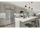 Modern kitchen with gray cabinets, stainless steel appliances, and white countertops at 220 Sanders St, Indianapolis, IN 46225