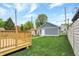 Wooden deck overlooking backyard with green lawn at 220 Sanders St, Indianapolis, IN 46225