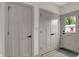 Bright hallway with two doors and a gray floor at 220 Sanders St, Indianapolis, IN 46225