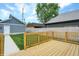 Wooden deck and view of backyard and garage at 220 Sanders St, Indianapolis, IN 46225