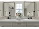 Elegant bathroom boasting double sinks and a view at 220 Sanders St, Indianapolis, IN 46225