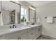 Modern bathroom with double vanity and updated fixtures at 220 Sanders St, Indianapolis, IN 46225