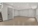 Unfinished basement with neutral walls and floors at 220 Sanders St, Indianapolis, IN 46225