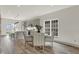 Kitchen dining area with gray cabinets and a round table with four chairs at 220 Sanders St, Indianapolis, IN 46225