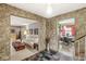 Entryway with slate tile floor and view into living room at 8433 Sunset Ln, , IN 46260