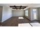 Sunlit living room showcasing hardwood floors and a view of the backyard at 1157 Paul Revere Dr, Mooresville, IN 46158