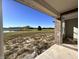 Covered patio overlooking a pond and field at 1157 Paul Revere Dr, Mooresville, IN 46158