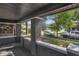 Front porch with brick columns and street view at 618 N Gladstone Ave, Indianapolis, IN 46201