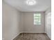 Cozy bedroom with carpet, window, closet, and overhead light at 618 N Gladstone Ave, Indianapolis, IN 46201