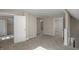 Spacious hallway with access to multiple bedrooms and carpeting at 618 N Gladstone Ave, Indianapolis, IN 46201