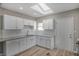 Renovated kitchen featuring white cabinets and granite countertops at 618 N Gladstone Ave, Indianapolis, IN 46201