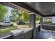 Front porch with brick columns and a view of the street at 618 N Gladstone Ave, Indianapolis, IN 46201