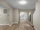 Living room with laminate floors and kitchen views at 618 N Gladstone Ave, Indianapolis, IN 46201