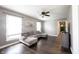 Spacious living room featuring hardwood floors, a comfy sectional sofa, and a modern fireplace at 5137 Kingsley Dr, Indianapolis, IN 46205