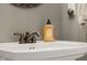 Clean and modern powder room with pedestal sink and bronze fixtures at 1750 Brookfield Dr, Columbus, IN 47201