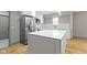 Modern kitchen with white cabinets and marble countertop at 4513 Norwaldo Ave, Indianapolis, IN 46205