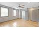 Bright bedroom with hardwood floors and ceiling fan at 4513 Norwaldo Ave, Indianapolis, IN 46205