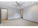 Bright bedroom featuring ceiling fan and ample closet space at 4513 Norwaldo Ave, Indianapolis, IN 46205