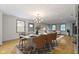 Dining area with a marble table and modern chairs at 4513 Norwaldo Ave, Indianapolis, IN 46205