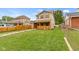 House's exterior showcasing a side yard with a wooden fence at 4513 Norwaldo Ave, Indianapolis, IN 46205