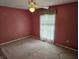 Simple bedroom with neutral walls and carpeted floors at 14 Winchester Ct, Anderson, IN 46013