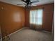 Charming bedroom with a ceiling fan and large window at 14 Winchester Ct, Anderson, IN 46013