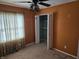 Bedroom with walk-in closet and ceiling fan at 14 Winchester Ct, Anderson, IN 46013