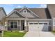 Craftsman style home with a two car garage at 10628 Maidenhair Dr, Indianapolis, IN 46239